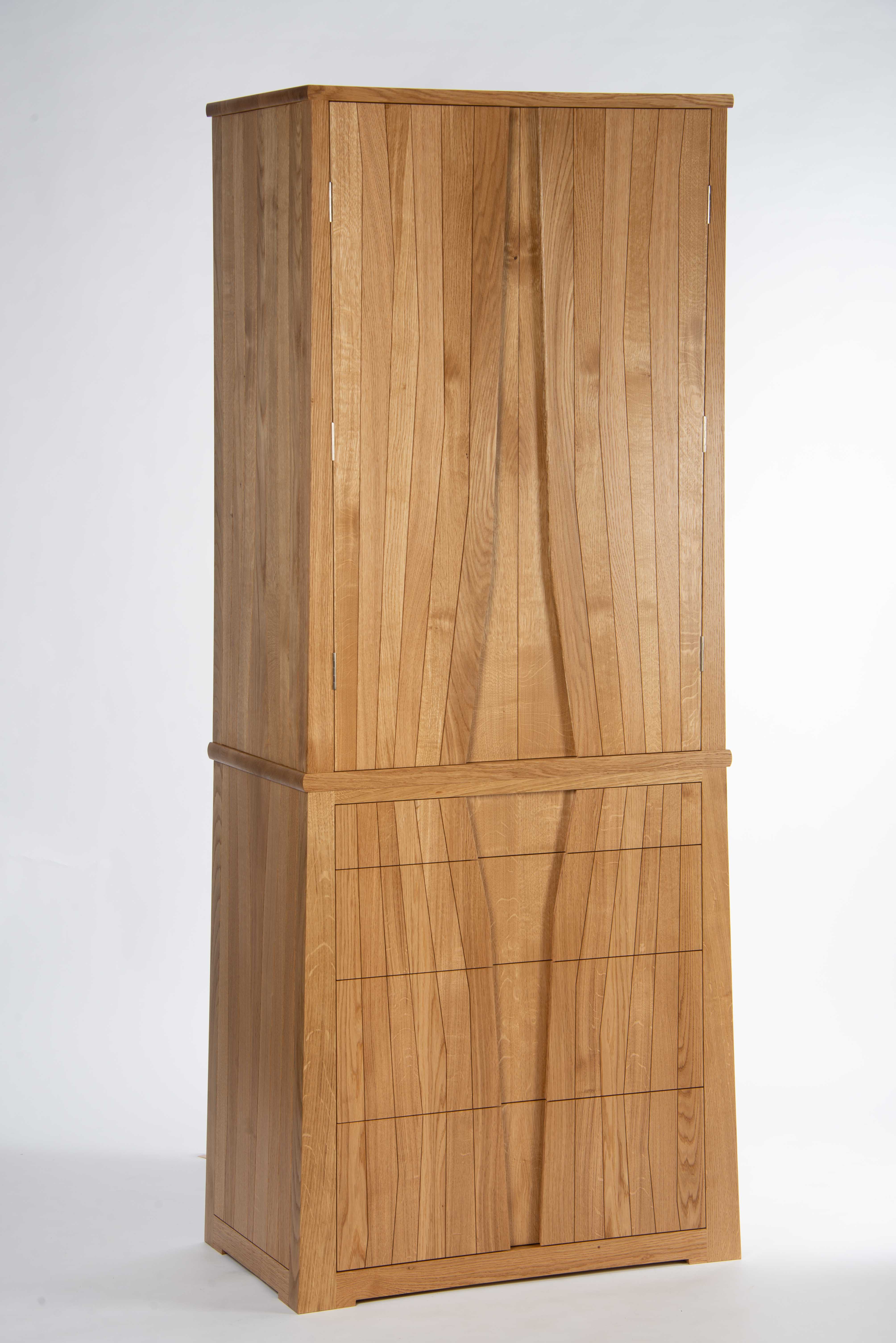 Tall bespoke oak wardrobe with book-matched grain doors and concealed hinges, handmade by Mark Eden Design