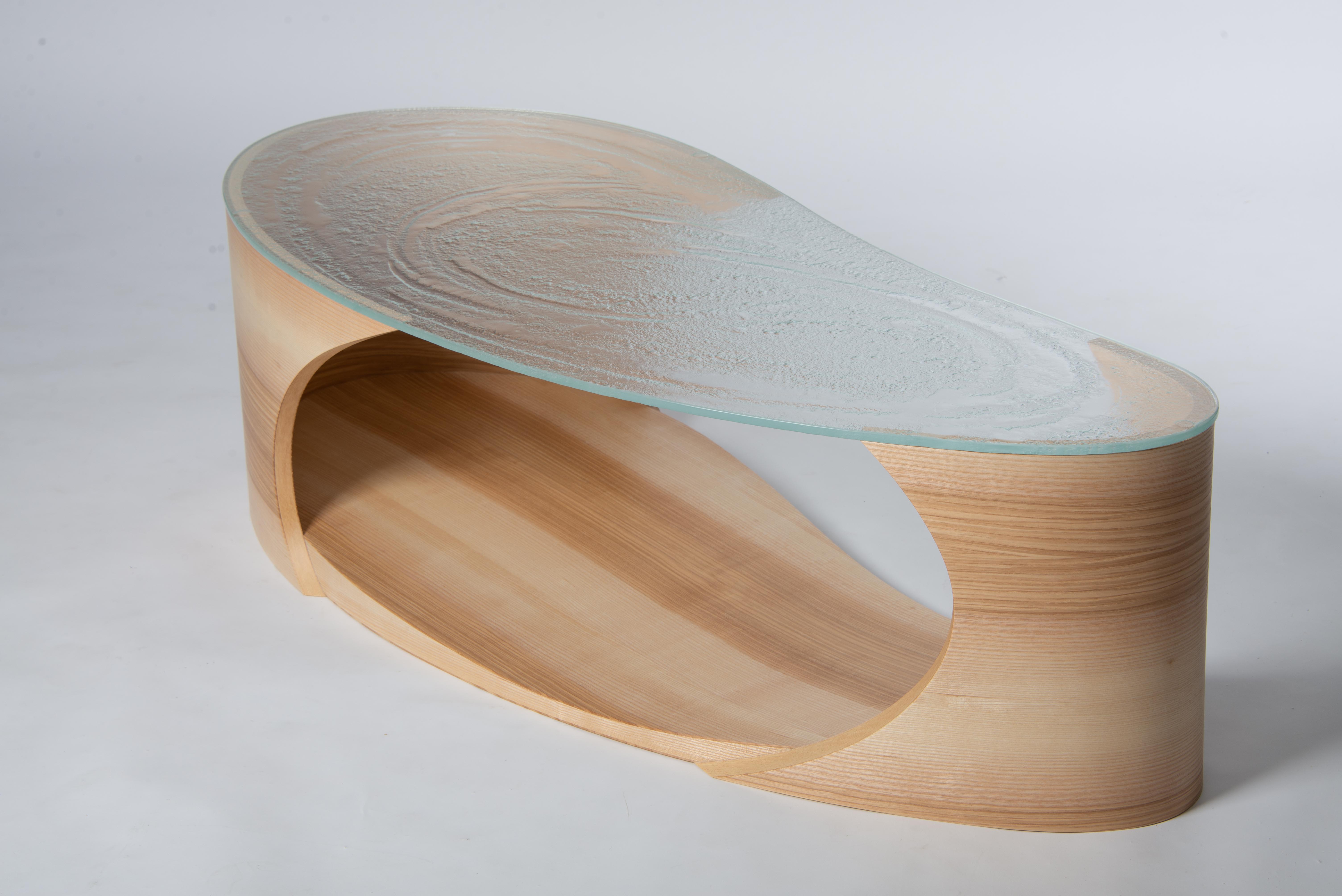 Sculptural ash coffee table with oval textured glass top and curved bentwood base, bespoke commission